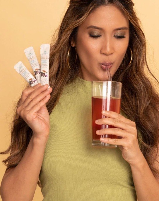 Woman enjoying PurelyB daily